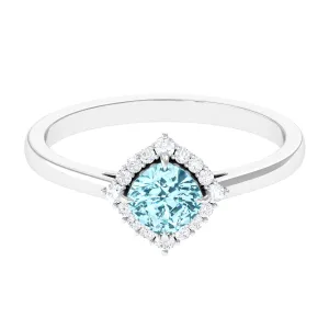 Cushion Cut Aquamarine and Diamond Halo Engagement Ring
