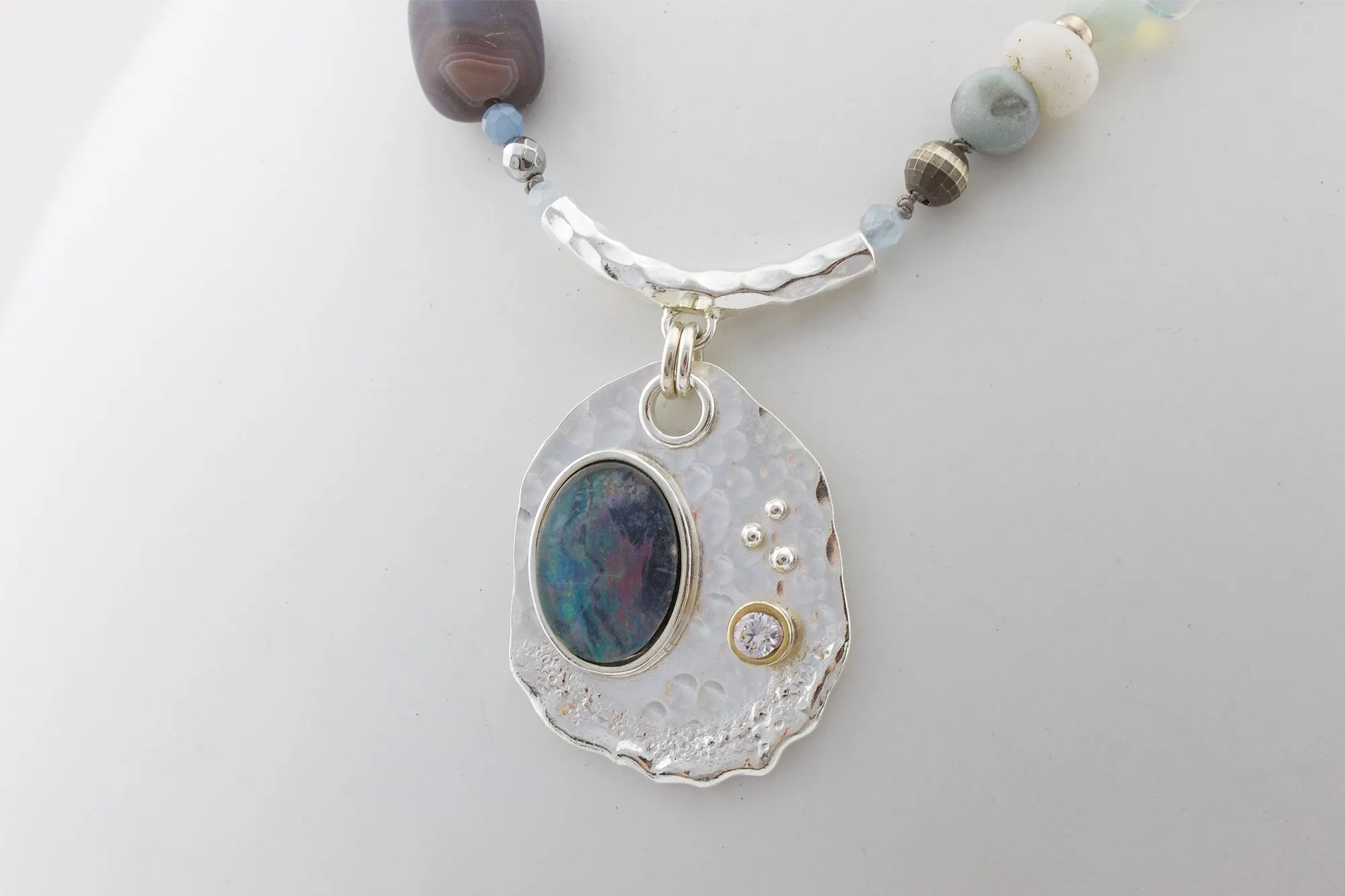 Opalescent Queen of Gems