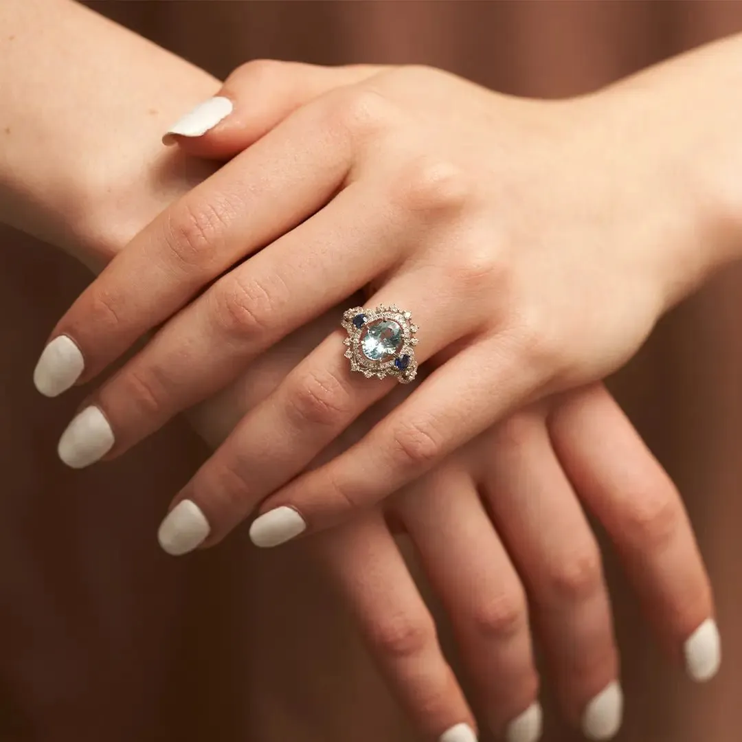 Oval-Cut Aquamarine, Sapphire & Diamond Halo Ring