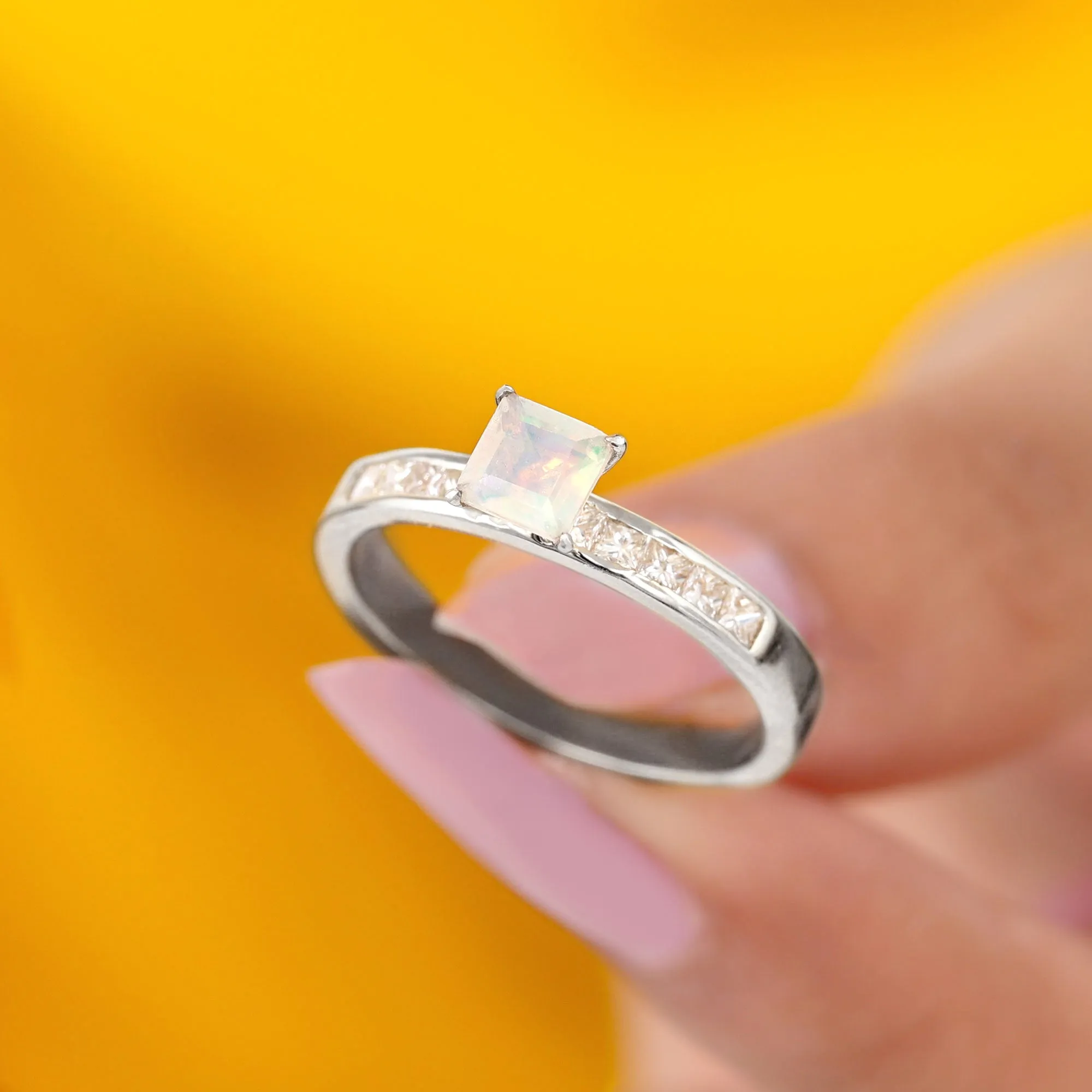 Princess Cut Ethiopian Opal Solitaire Ring with Diamond Side Stones